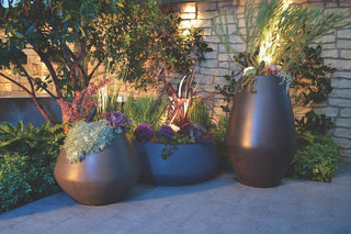 Creating a Stunning Outdoor Space: Design Tips Using Planters, Fire Pits, and Large Vases - Modofire