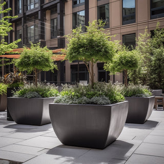 Planting Ideas for Large-Scale GFRC and Metal Planters: Choosing by Climate