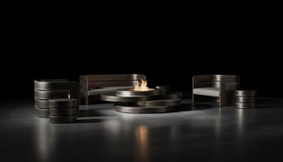 Modern outdoor fire pit with seating area on a dark background