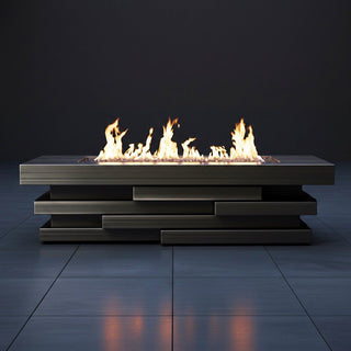 Modern outdoor fire pit with flames on a dark background